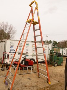 lot 11 image: Werner 10 Podium step ladder. Fiberglass needs some repair. As shown.