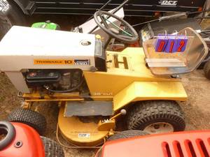lot 12 image: Vintage Mongomery Wards 10 HP Garden tractor. All steel. 36 deck. Looks complete. Untested. As shown.