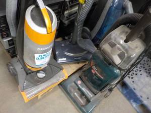 3 Vacuum Cleaners...