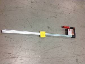 lot 21 image: BESSEY TG Series 40 in. Bar Clamp with Wood Handle and 4-12 in. Throat Depth in good condition