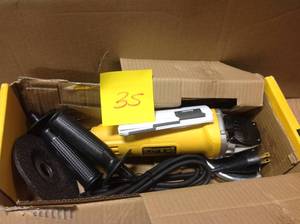 lot 35 image: DEWALT 7 Amp 4-12 in. Small Angle Grinder with 1-Touch Guard in good condition