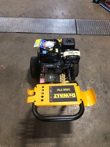 lot 106 image: DEWALT Honda GX200 3,400 PSI 2.5 GPM Gas Pressure Washer I. Good condition, missing hose and gun Etc.