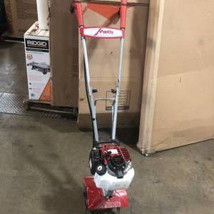 Mantis 25cc 4-Cycle Plus Gas Mini Tiller in working conditions