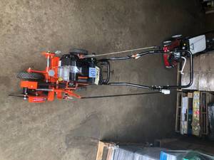 Powermate 9 in. 79cc Gas Walk-Behind Edger with Curb Hopping Feature in working conditions