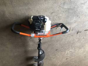 Powermate 43cc Earth Auger Powerhead with 8 in. Bit in working conditions