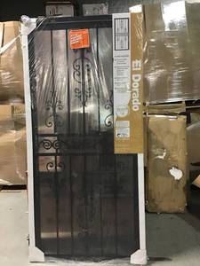 lot 21 image: PALLET WITH UNIQUE HOME DESIGNS 36 in. x 80 in. El Dorado Black Surface Mount Outswing Steel Security Door with Heavy-Duty Expanded Metal Screen( NOT USED)
