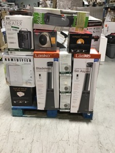 Pallet whit assorted of heaters diferent sizes and conditions costumers returns