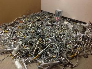 Lot whit Full of salvage branded faucets shower heads for parts or repair