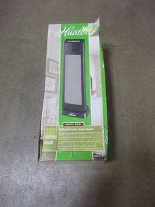 lot 816 image: Hunter 24 in. 1500-Watt Digital Ceramic Tower Heater with Remote Control HPQ15C-EA