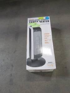 lot 836 image: Crane 19 in. 1500-Watt Ceramic Mini Tower Heater in Black EE-7588