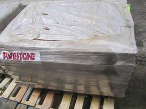 lot 221 image: Entire Pallet - Pavestone RumbleStone 10.5 in. x 3.5 in. x 5.25 in. Cafe Concrete Edger (144 Pcs.  125 Lin. ft.  Pallet) 95569