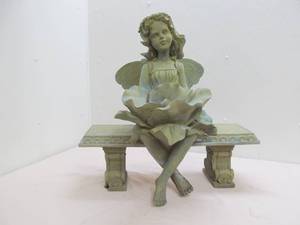 garden fairy on bench