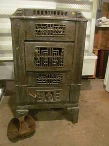 vintage Montgomery Wards cast iron furnace