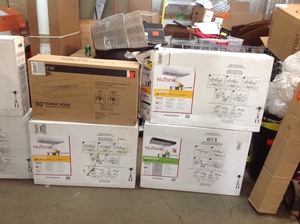 Pallet with Assorted nerver used Nutone Range Hoods Retails Approx $900