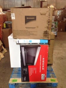 Pallet of assorted appliances customer returns including freezers, microwes and more see pictures