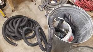 lot 19 image: 12 HP Sump Pump w Many feet of Hose