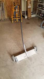 lot 58 image: 24 Rolling Magnet Sweeper