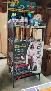 lot 167 image: Bissell Big Green Metal Display Rack and (31) Bottles Bissell Cleaners and Scrubbers