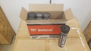 lot 212 image: (7) Tubes Bobcat Extreme HP Grease for Pivot Points  10w-30 Bobcat Oil (Partial)