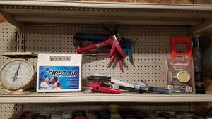lot 294 image: Shelf Lot of Caulking Guns, Vintage Scale, First Aid Kit and More