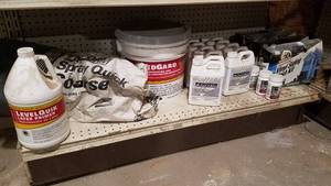 lot 297 image: Shelf Lot of Ceiling Texture, Penofin Concrete Etcher, Armor-all Vinyl Siding Washing Kits and More