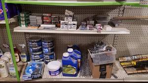 lot 302 image: 2 Shelves of Assorted Packages of Brad Nails, Weather Bond Cover Strip, Penofin and More