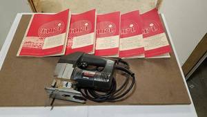 lot 328 image: Black and Decker Jigsaw Model 3157 and Lot of Appliance Repair Manuals