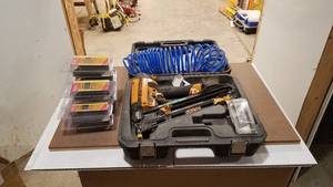 lot 364 image: Bostitch Pneumatic Finish Nailer w 9 Packs of Extra Nails