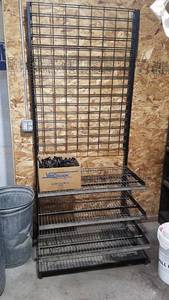 lot 370 image: Black Metal Display  Storage Shelf - Includes Large Box of Hooks for the Shelf