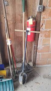 lot 137 image: Post Hole Digger and Rake Lot