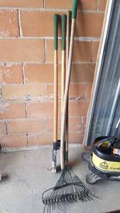 lot 136 image: Post Hole Digger and Rake Lot