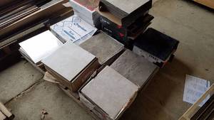 lot 23 image: 7 Piles of Various Ceramic and Vinyl Tile
