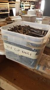 lot 64 image: Bucket of 10d Cut Nails