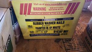 lot 102 image: 50 LB Box 1-12 White Rubber Washer Nails