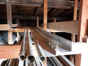 lot 165 image: (2) 15 Garage Door Angle Iron and (3) Assorted Metal Pipe