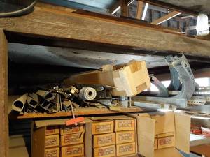 lot 187 image: Shelf Lot of Garage Door Rails and Parts