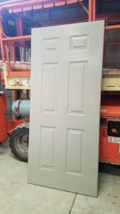 lot 358 image: Steel Exterior Door Sandstone and Pecan Wood Grain Interior
