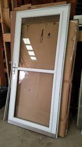 lot 442 image: 36 Storm Door W Frame and Lockset