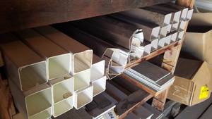 lot 499 image: Inventory of White and Brown Vinyl Gutters, Down Spouts and Parts