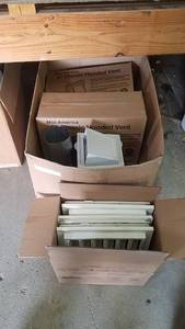 lot 296 image: Large Lot of Dryer Vent Kits and Louvers