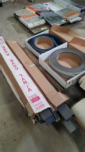 lot 338 image: Pallet Lot of Vinyl Base Board Trim
