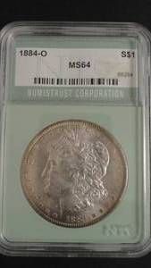 lot 4 image: 1884o Morgan Silver Dollar Graded NTC MS64