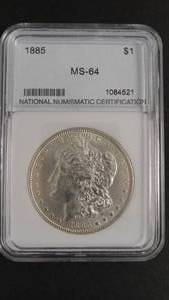 lot 5 image: 1885 Morgan Silver Dollar Graded National Numismatic Certification MS64