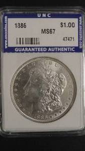 lot 6 image: 1886 Morgan Silver Dollar Graded Uncoin.com MS67