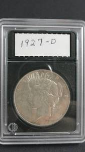 lot 21 image: 1927d Peace Silver Dollar