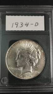 lot 22 image: 1934d Peace Silver Dollar