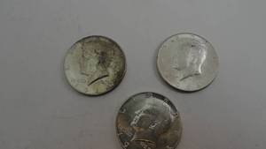 lot 63 image: 3- 1964 Kennedy Half Dollar