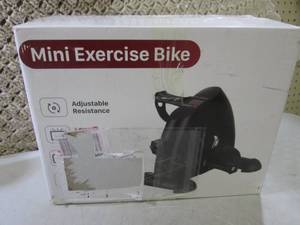 lot 13 image: Mini Exercise Bike Adjustable Resis...
