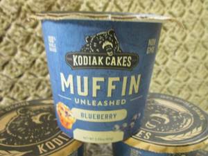 lot 130 image: 10 Kodiak Cakes Blueberry Muffin Un...