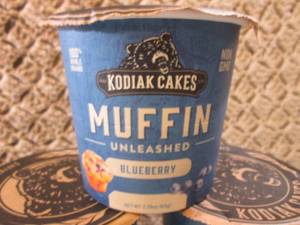 lot 133 image: 10 Kodiak Cakes Blueberry Muffin Un...